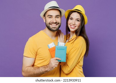 Traveler Tourist Happy Couple Two Friends Family Man Woman Wear Summer Clothes Hat Isolated On Plain Violet Background Studio. Passenger Travel Abroad On Weekends Getaway. Air Flight Journey Concept