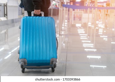 Traveler Tourists Dragging Luggage, Baggage Reclaimed Cancel Flights Stop, Prevent COVID-19 Virus Disease, Stop Covid-19 Travel Suitcase In Empty Airport That Restrict To Avoid World Pandemic COVID-19