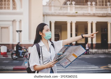 Traveler, Travel Young Asian Woman Or Girl Using Local Map To Sightseeing, City Tourism On Happy Sunny Day. Guide Backpacker Tourist, Holiday Trip,summer Holiday Or Vacation, Hobby Concept.