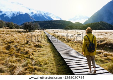 Traveler walking to the Mountain cook with beautiful view at South Newzealand.