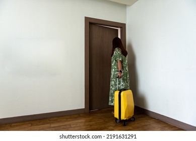 Traveler Woman With Baggage Open The Bedroom Door.