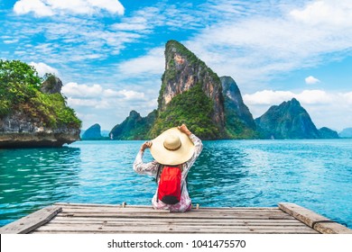Traveler woman joy relaxing on wood bridge in beautiful destination island, Phang-Nga bay, Adventure lifestyle travel Thailand, Tourism nature landscape Asia, Tourist on summer holiday vacation trips