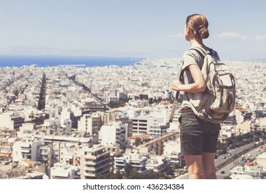 Traveler Woman Looking On A Big City, Travel And Active Lifestyle Concept