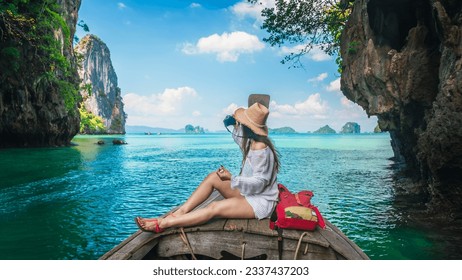 Traveler woman on boat with camera joy nature scenic landscape Ko Hong island Krabi, Attraction famous place tourist travel Phuket Thailand summer holiday vacation trip, Beautiful destination Asia - Shutterstock ID 2337437203