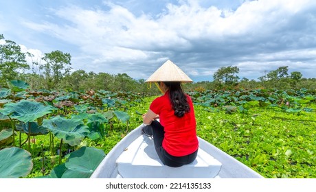 Traveler Woman On A Boat Tour Along The Canals In The Mangrove Forest. This Is An Eco Tourism Area At Mekong Delta In An Giang, Vietnam