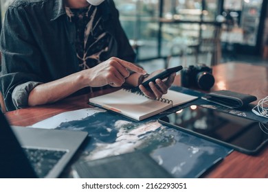 Travelers planning trips and use mobile phones to book hotels, buy plane tickets, search map, or find travel routes. Travel concept.
 - Powered by Shutterstock