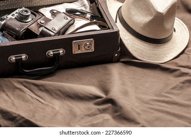 Traveler's Suitcase With Vintage Items