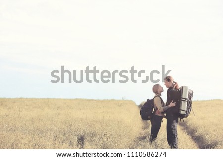 Similar – Image, Stock Photo Couple kissing on the field