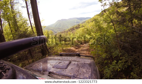 Traveling by car in the\
mountains. Ukrainian expedition \