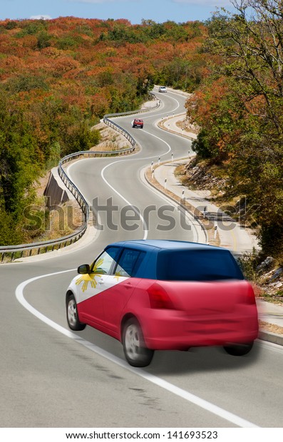 traveling\
car in national flag of philippines colors and beautiful road\
landscape for tourism and touristic\
adertising