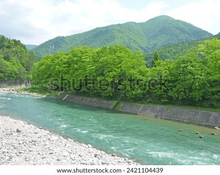 Traveling in Japan and photographing mountain streams and suspension bridges