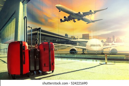 traveling luggage in airport terminal building and jet plane flying over sky