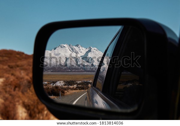 Traveling New\
zealand Mountain Ice Car\
rearview