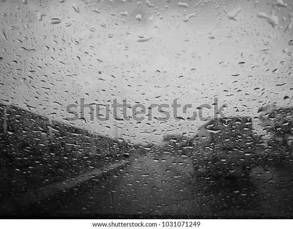 Traveling in the rain, I\
was in the car.