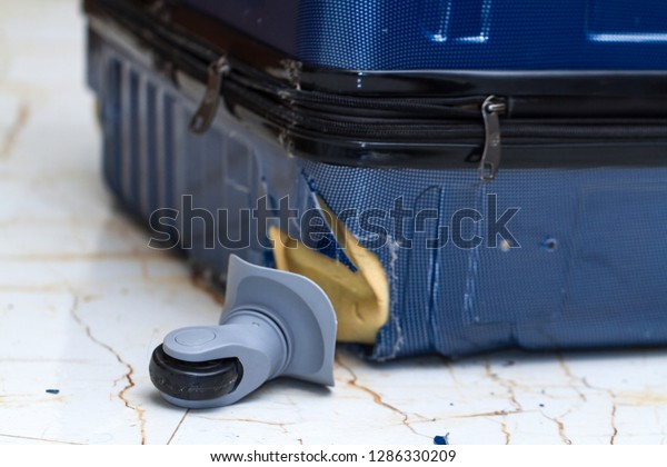 broken suitcase wheel