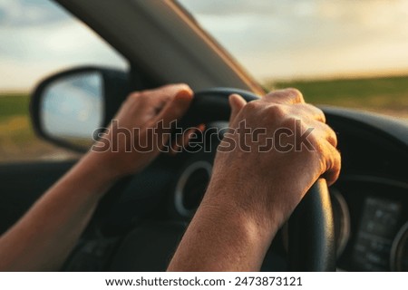 Similar – Image, Stock Photo Sunset drive Driving alone