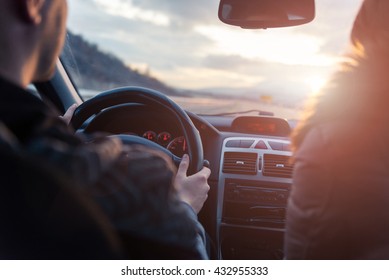 Traveling Together Towards The Sun By Car. Lens Flare.