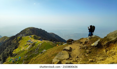 A Traveller Admiring the view at Triund, Indrahar Pass Trail, Dauladhar Range, Himachal Pradesh, India - 19 Oct 2018