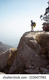 A Traveller Admiring the view at Triund, Indrahar Pass Trail, Dauladhar Range, Himachal Pradesh, India.