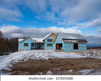 Traverse City, Mi/USA-December 4, 2019.  New Home Construction In Northern Michigan Continues Throughtout The Winter As Demand Outpaces The Supply Of Builders Available To Build New Homes.