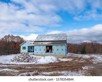 Traverse City, Mi/USA-December 4, 2019.  New Home Construction In Northern Michigan Continues Throughtout The Winter As Demand Outpaces The Supply Of Builders Available To Build New Homes.