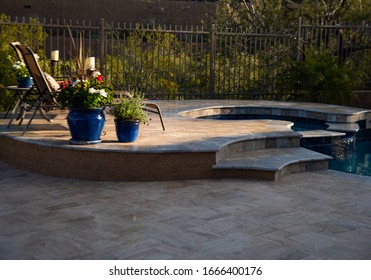 A Travertine Tile Pool And Spa In Arizona.