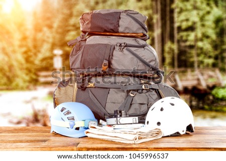 Travle backpack and river with forest 