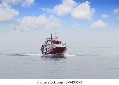 Trawler Fishing Boat Sailing In Open Waters