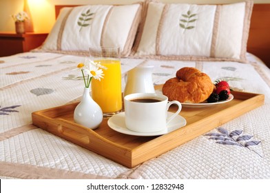 Tray With Breakfast On A Bed In A Hotel Room