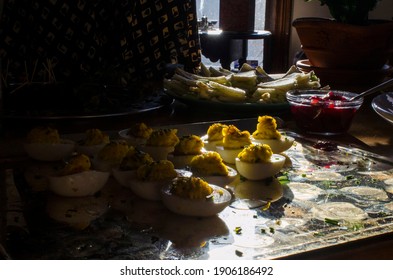 A Tray Of Deviled Eggs In Dramatic Sunlight