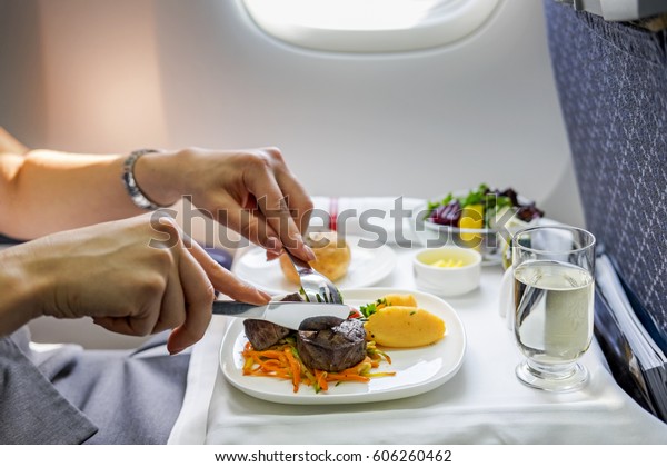 Tray of food on the plane\
