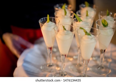 tray with glasses of ice cream sorbet with drink - Shutterstock ID 1476134435