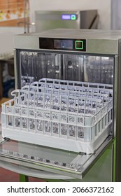 Tray With Glasses In Open Commercial Dishwasher Machine