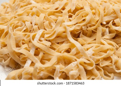 A Tray Of Hand Rolled Fettucine Pasta Made From Scratch