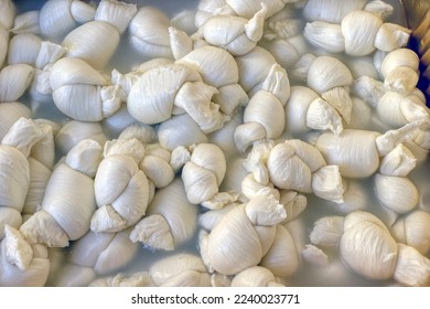 Tray of knots, a type of mozzarella from Puglia, Southern Italy - Shutterstock ID 2240023771