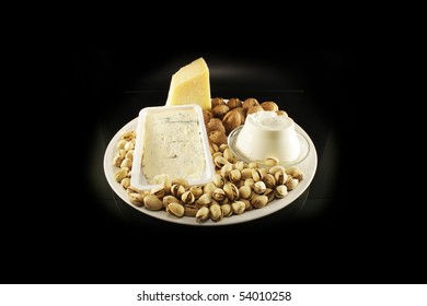 A tray with nuts and cheese