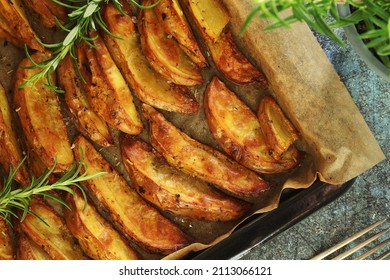 A tray with potatoes backed in oven	