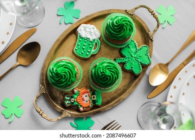 Tray with tasty treats for St. Patrick's Day celebration on table - Powered by Shutterstock