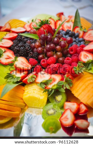 tray of various delicious, tropical fruits
