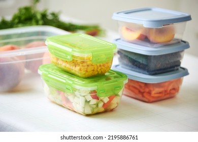 Trays With Raw Cut Vegetables For Freezing On Table. Storage For Winter Storage In Plastic Containers