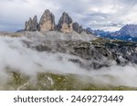 Tre Cime di Lavaredo alpine scene.Dolomites beautiful mountain landscape on a sunny day. Hiking in the Alps in Italy, South Tirol mountain range of Alpi Dolomiti di Sesto near Cortina di Amprezzo and 