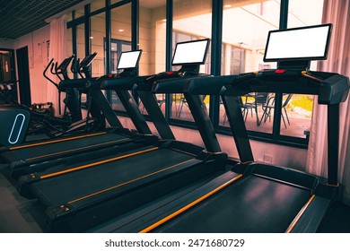 Treadmills with white screen for runners in a Gym for workout and indoor run and walk