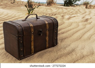 Treasure Chest In Sand Dunes On The Beach