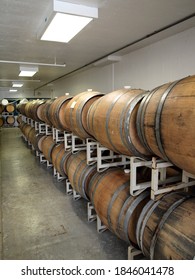 Treasure Island, California - October 8, 2011: Rows Of Wooden Barrels Inside Wine Barrel Room At Winery.