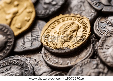 A treasure of Roman gold and silver coins.Trajan Decius. AD 249-251. AV Aureus.Ancient coin of the Roman Empire.Authentic  silver denarius, antoninianus,aureus of ancient Rome.Antikvariat.