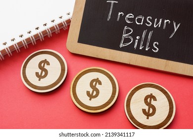 Treasury Bills Are Shown On A Photo Using The Text And Sign Of Dollar