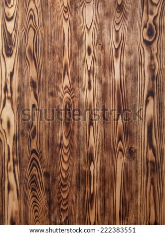 treated surface of burned planks of chestnut tree