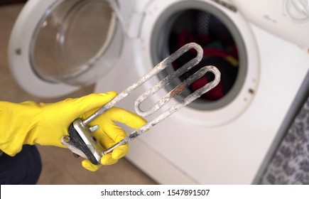 Treatment of Calcium Deposits in Water Heater. Limescale on the heating element for washing machine.  Replacing a heating element