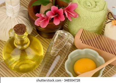 Treatments Hair With Flowers Hibiscus, Olive Oil, Coconut Oil And Egg Yolks.