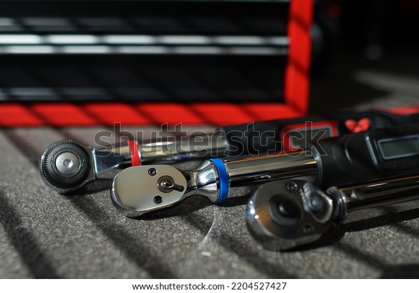 Tree Digital\
Torque wrenches  and Click Type Torque Wrench  Auto mechanic using\
Torque wrench auto mobile